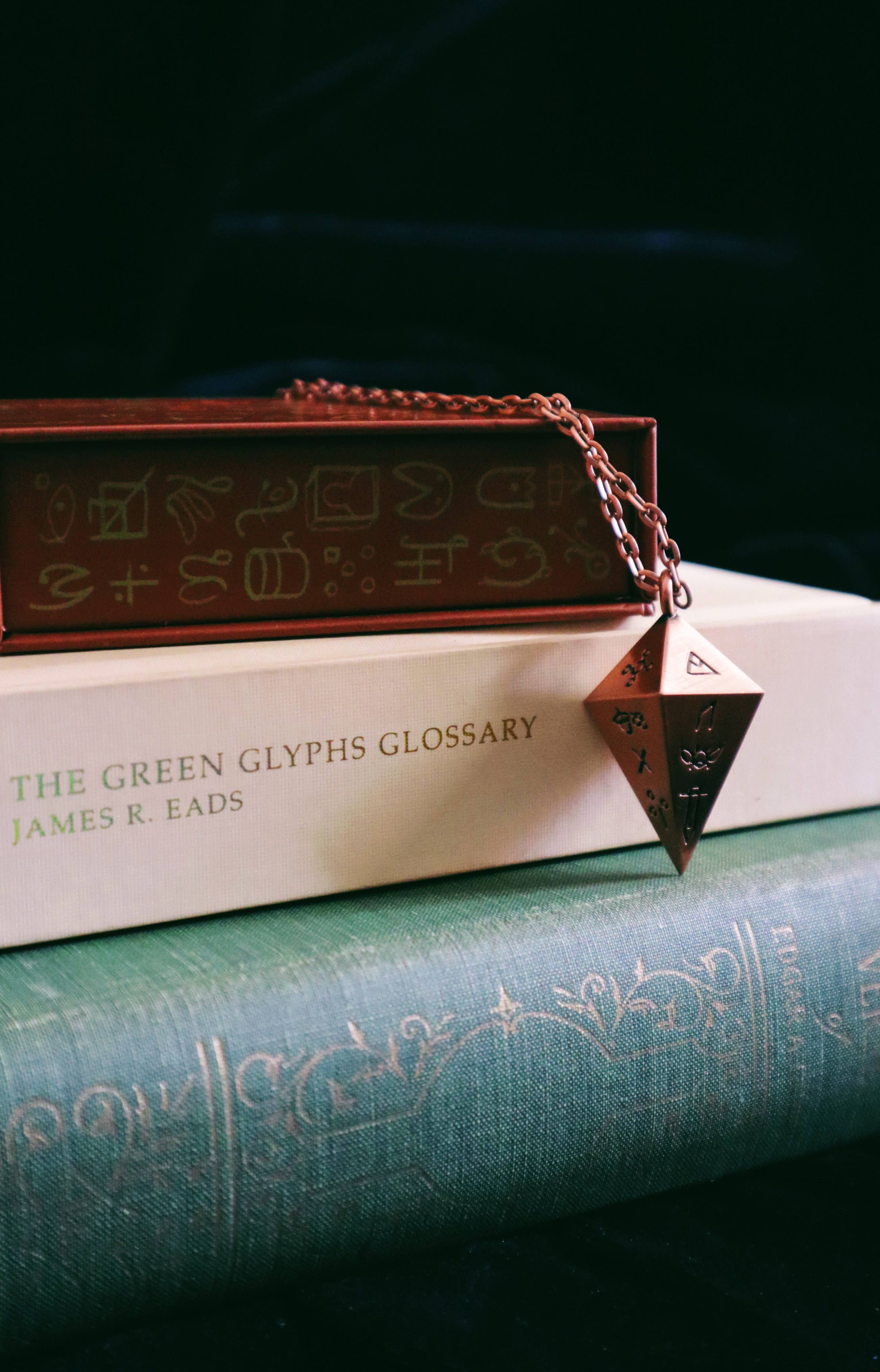 Green Glyphs Pendulum